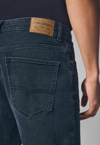 Next VINTAGE AUTHENTIC - Tapered-Farkut - blue ink washed