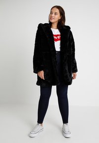 Urban Classics Curvy LADIES HOODED COAT - Winter coat - black