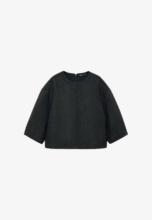 Haut noir surdimensionné, texturé, avec un col rond, des épaules tombantes et des manches trois-quarts, doté d'une fermeture éclair au dos.