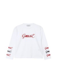 Camicia bianca a maniche lunghe con ricamo rosso "GAELLE" sul davanti e dettagli in nero e rosso sulle maniche. Materiale in cotone.