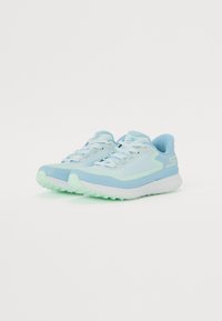 Light blue athletic shoes with a textured mesh upper, contrasting mint accents, a cushioned sole, and patterned rubber outsole.