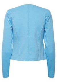 Veste ajustée à manches longues de couleur bleu clair, vue de dos, avec des détails de coutures simples et sans boutons ni fermetures visibles.