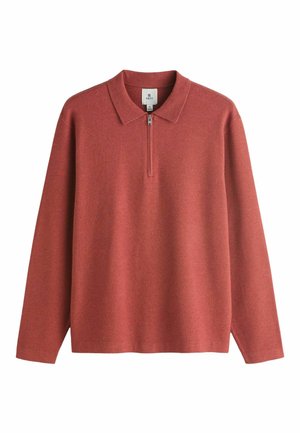 Polo a maniche lunghe di colore rosso smorzato con colletto con zip. Realizzato in tessuto morbido dalla texture liscia e design minimalista.