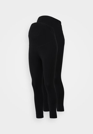 Sorte leggings med en glat tekstur, der har en høj talje. To størrelser vist side om side, begge med en tætsiddende design.