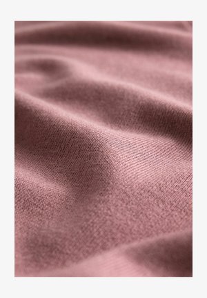 Tejido texturizado de un tono rosa apagado, que presenta un suave patrón tejido con sutiles variaciones en el tono y un acabado liso.