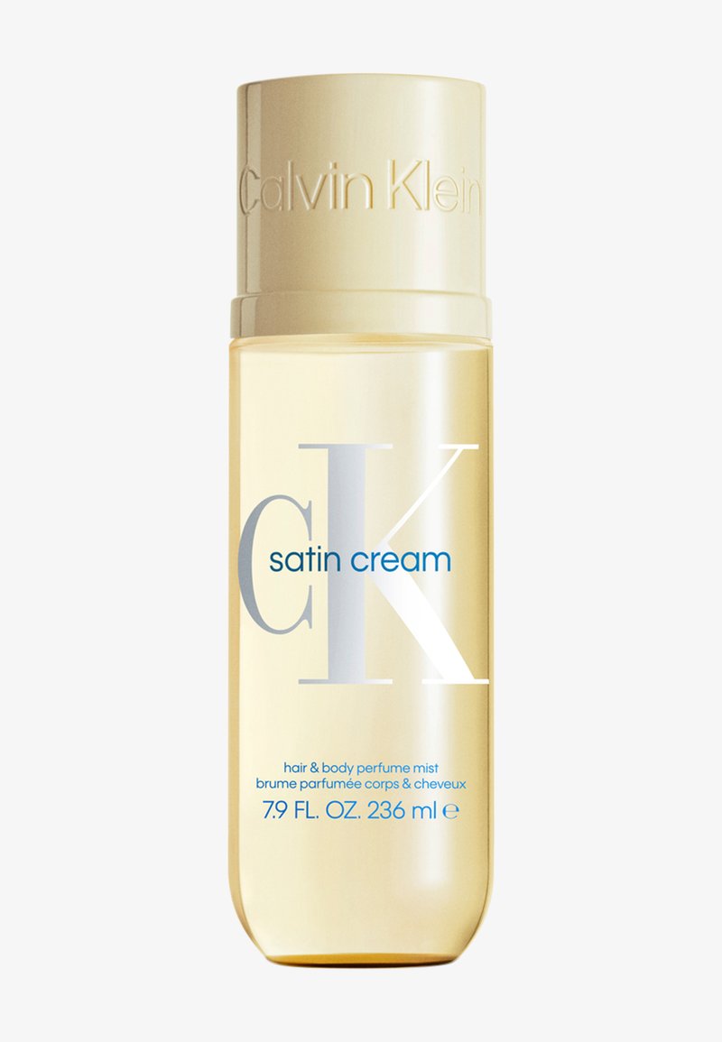 Brume parfumée pour cheveux et corps Calvin Klein CK Satin Cream dans un flacon transparent beige de 7,9 FL OZ (236 ml) avec bouchon beige.