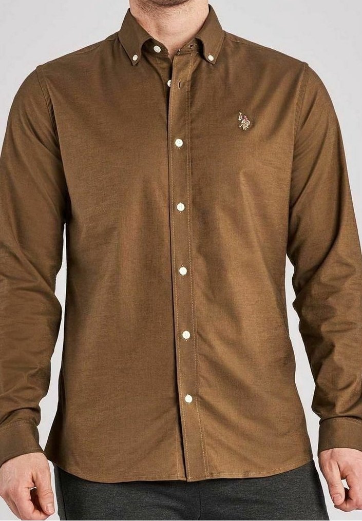 Brown, long-sleeve shirt in a soft fabric, featuring a button-down collar, white buttons, and a small embroidered logo on the chest.