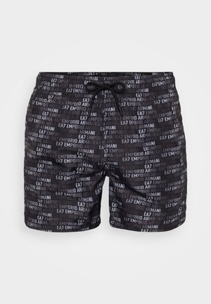 Costume da bagno neri con motivo a logo ripetuto in bianco, dotati di vita con cordino e realizzati in un tessuto leggero adatto per le attività acquatiche.