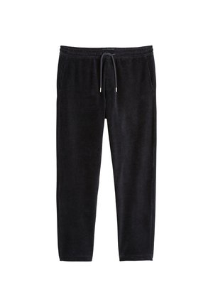 Pantaloni da tuta neri in velluto con cintura elastica, chiusura con cordoncino e due tasche laterali. Texture liscia con una forma aderente.