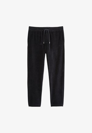 Zwarte velours joggingbroek met een elastische tailleband, aantrekkoordsluiting en twee zijzakken. Gladde textuur met een aansluitende pasvorm.