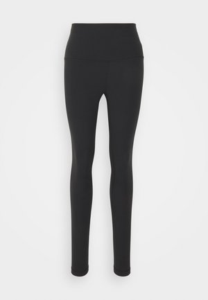 High-waisted black leggings made of stretchy fabric, featuring a smooth surface and full-length design with a fitted silhouette.