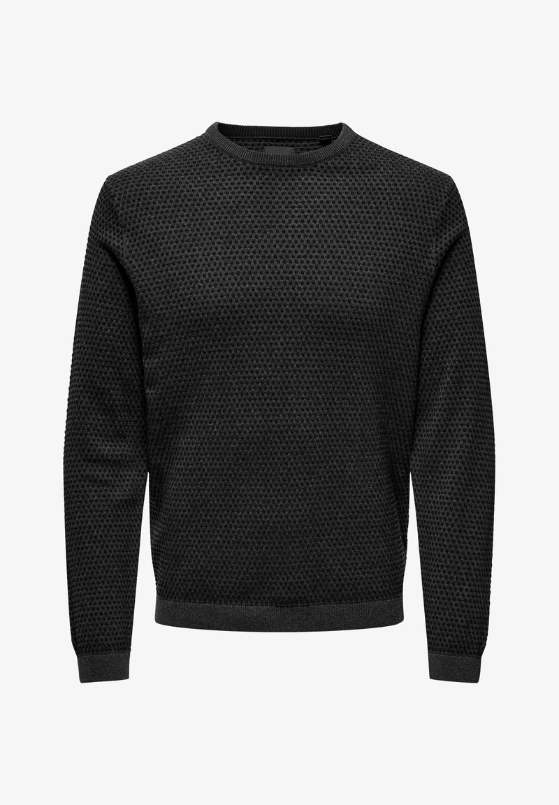 Maglione nero a texture con scollo rotondo, maniche lunghe e un sottile pattern a nido d'ape. Orlo e polsini a coste.