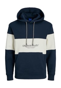 Sweatshirt à capuche bleu marine et crème avec une poche frontale, arborant un logo métallique et des accents de cordon. Mélange de coton avec une texture douce.