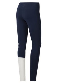 Marinblå leggings med en vit nedre panel. Har en åtsittande passform, slät textur och en logotyp på den övre baksidan, designade för aktiv träning.