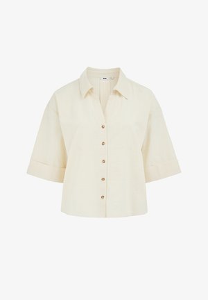 Cămașă scurtă cu mâneci scurte, de culoare bej deschis, cu dungi verticale subtile, guler ascuțit și cinci nasturi maro pe partea din față.