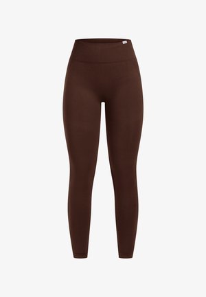 Brown leggings with a high waist, made from a smooth, stretchable fabric. The design features a fitted silhouette and seamless construction.