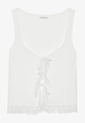 Camiseta sin mangas blanca con canalé, con escote en V, detalle de cordones en la parte delantera y borde de encaje en el dobladillo. Confeccionada en una tela suave con un diseño ajustado.