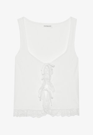 Valge soonikuline top, millel on V-kaelus, nööriga esikülg ja pitsäär. Valmistatud pehmest kangast ja disainitud sobivana.