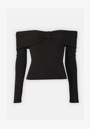 Melnas off-the-shoulder blūzes ar loku akcentu ap kaklu, garām piedurknēm un pieguļošu dizainu no gludas, elastīgas auduma.