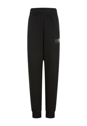 Pantaloni da jogging neri con vita elastica, polsini affusolati e un piccolo logo grigio Puma sulla coscia sinistra. Realizzati in tessuto morbido.