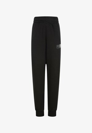 Pantaloni da jogging neri con vita elastica, polsini affusolati e un piccolo logo grigio Puma sulla coscia sinistra. Realizzati in tessuto morbido.