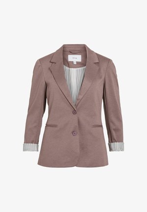 Blazer marrone chiaro con vestibilità tailored, presenta due bottoni frontali, due tasche e dettagli a strisce sui polsini. Realizzato in un tessuto morbido.