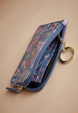 Floral-patterned wallet in shades of blue and pink, made of fabric with a zipper closure, featuring a gold keyring and multiple compartments.
