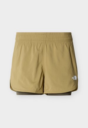Αθλητικό σορτς ανοιχτού καφέ με ελαστική μέση και εσωτερική στρώση συμπίεσης, με το λογότυπο The North Face στο μπροστινό δεξί πόδι.