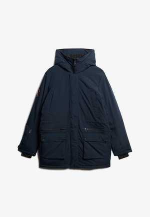 Marineblauwe geïsoleerde parka jacket met een capuchon, voorzien van twee voorzakken en ritsaccenten. Glad, waterafstotend materiaal.