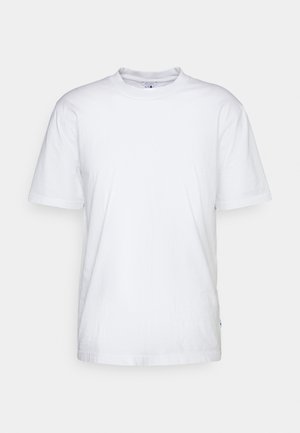 T-shirt bianco in cotone con collo rotondo, maniche corte e orlo dritto. Presenta un piccolo etichetta del marchio sul lato sinistro.