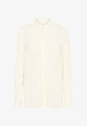 Cream-colored blouse made of soft fabric. Features a high ruffled collar, button front, and ruffle detailing down the center. Long sleeves.