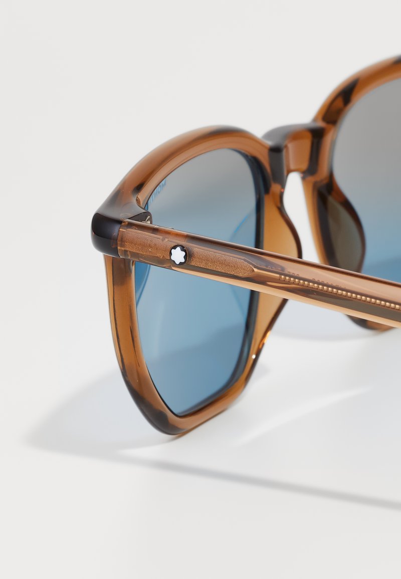 DESIGN - Occhiali Da Sole Rotondi Tartarugati Con Lenti Blu