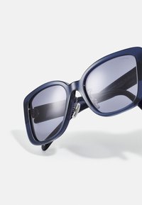 COACH Päikeseprillid - transparent blue