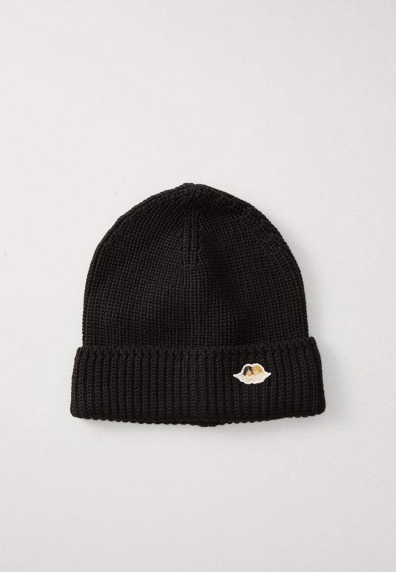 Black knitted beanie hat with a ribbed design and a small embroidered patch featuring a cartoon character. Soft texture, casual fit.