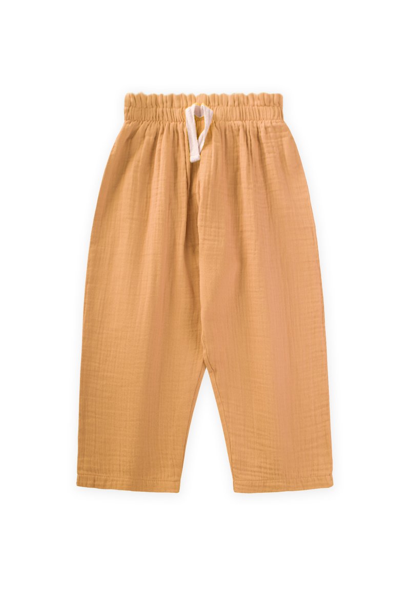 Puuvillasegu püksid soojas, pehmes oranžis toonis. Omavad elastset vöökohta koos paelaga ja lõdva istuvusega, lühendatud jalgadega.