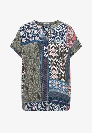 Blouse manches courtes avec un patchwork de motifs floraux et géométriques en marine, olive, rose et blanc.