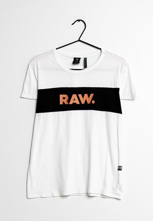 White T-shirt with short sleeves, featuring a black horizontal band with the word "RAW." in orange. Made of soft cotton material.