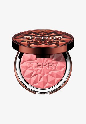 Blush compact with a geometric, faceted design; transparent lid; pink powder inside; logo 'BY TERRY' embossed on the surface.