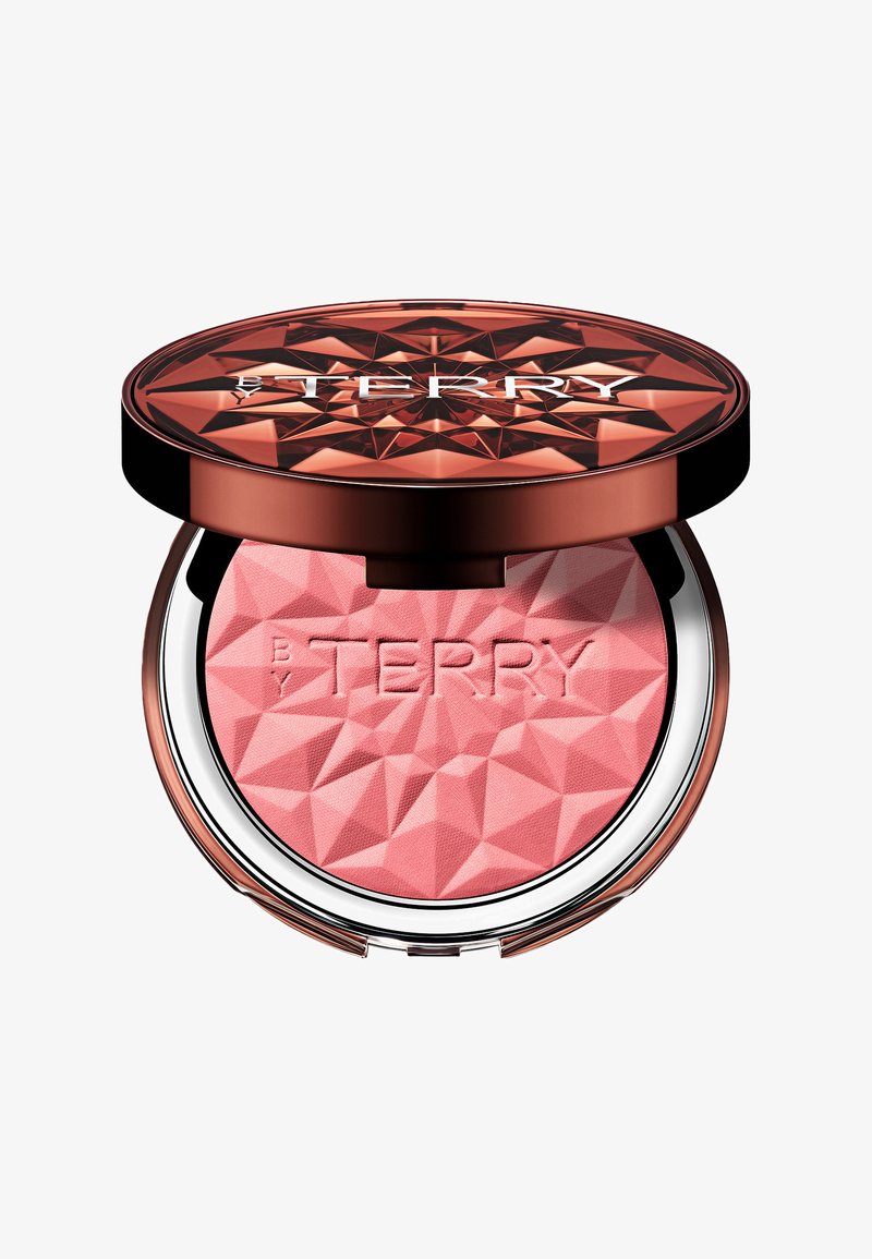 Rouge-Puder in einem geometrischen, facettierten Design; transparenter Deckel; rosa Puder im Inneren; das Logo 'BY TERRY' ist auf der Oberfläche geprägt.
