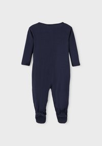 Marinblå en-dels jumpsuit gjord av mjukt tyg, med lång ärm, elastiska muddar och fotsydd design för värme och komfort.