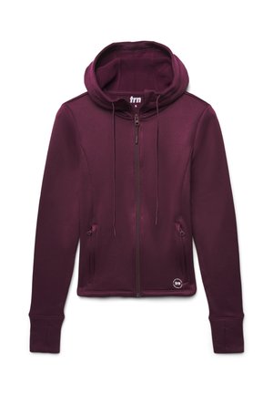 Felpa con zip color bordeaux presenta un cappuccio con cordino, due tasche frontali e polsini a costine. Realizzata in tessuto morbido con una sottile lucentezza.