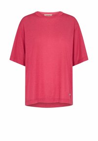 Tričko s krátkým rukávem a volným střihem v jasně růžovém materiálu, s kulatým výstřihem a jemným logem na lemu. Hladká textura.