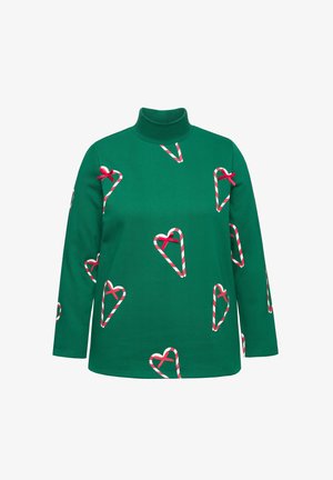 Maglione verde a maniche lunghe con collo alto, caratterizzato da motivi a cuore di bastoncini di zucchero con accenti rossi e una texture liscia.