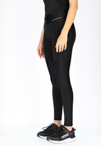 Swedemount PERFORMANCE TIGHTS W - Leggings - glossy black
