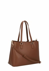 Brązowa syntetyczna torebka o ustrukturyzowanym kształcie, z podwójnymi uchwytami i odpinanym paskiem na ramię. Zawiera srebrne ozdoby w kolorze metalu.