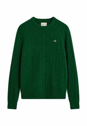 Grüner Kabelstrickpullover mit Rundhalsausschnitt, langen Ärmeln und gerippten Bündchen. Kleines Logodetail auf der Brust, aus weichem Wollmix gefertigt.