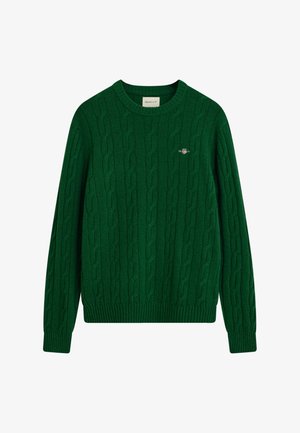 Grüner Kabelstrickpullover mit Rundhalsausschnitt, langen Ärmeln und gerippten Bündchen. Kleines Logodetail auf der Brust, aus weichem Wollmix gefertigt.