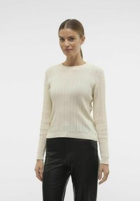 Maglione lavorato a maglia color crema chiaro con strisce verticali, scollatura rotonda e maniche lunghe. Presenta un motivo testurizzato e orlo a coste.