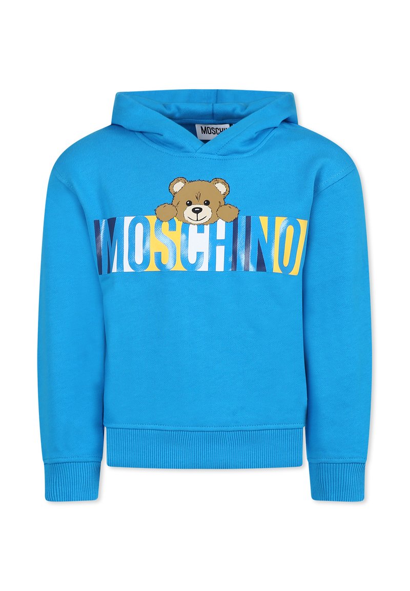 Sweat à capuche bleu avec un graphique d'ours et logo "Moschino" en lettres grasses jaunes et blanches. Présente une capuche avec cordon de serrage et des poignets côtelés.
