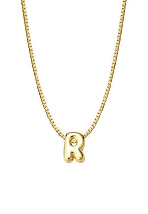 Zelta ķēdes kaklarota ar teksturētu, pārmērīgu burtiem "R" piekariņu. Ķēde ir ar taisnstūrveida acu dizainu un spīdīgu metāla apdari.